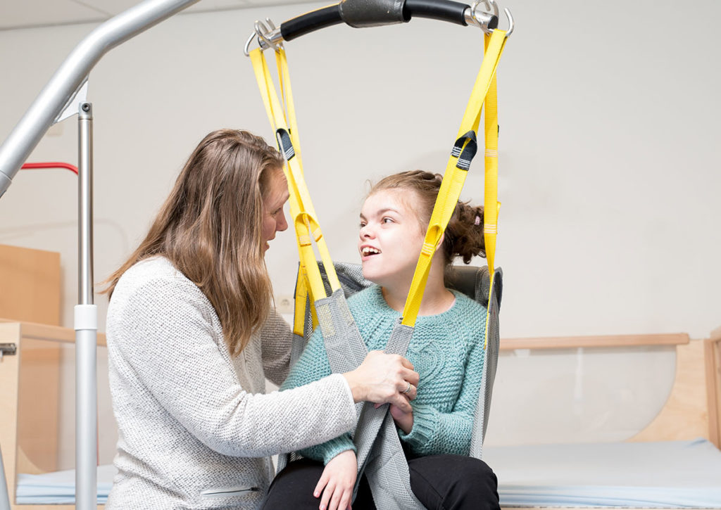 child using specialist lifting equipment