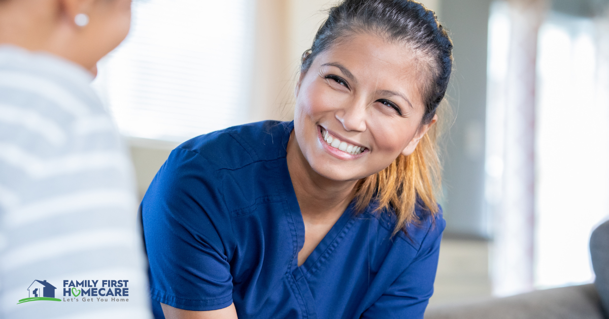 female nurse in a home smiling