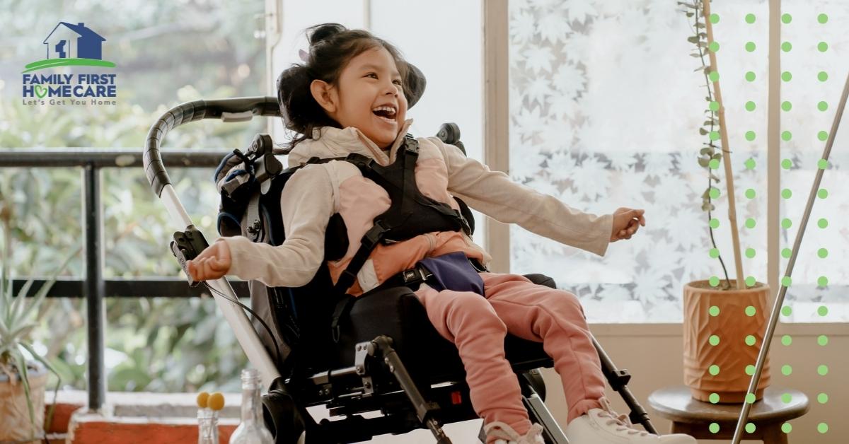 A pediatric homecare patient wearing pink smiling in her wheelchair