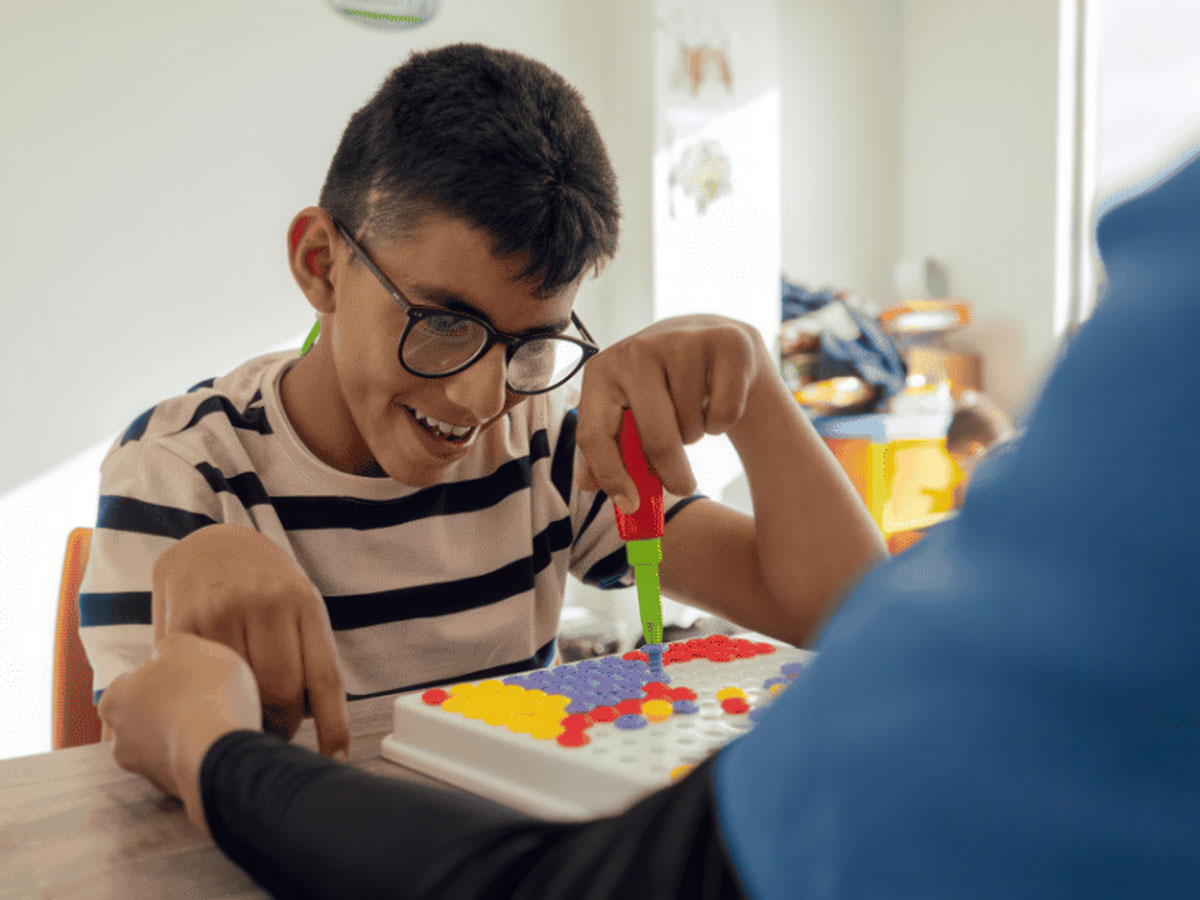 Boy with colored dots game